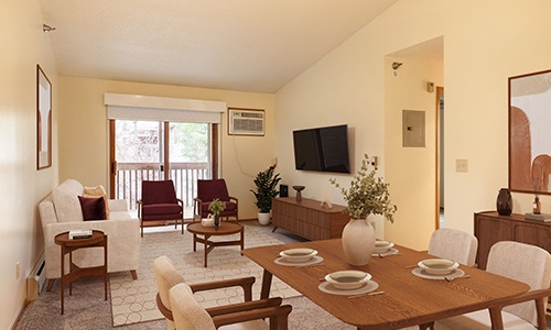 living room with couches and chairs